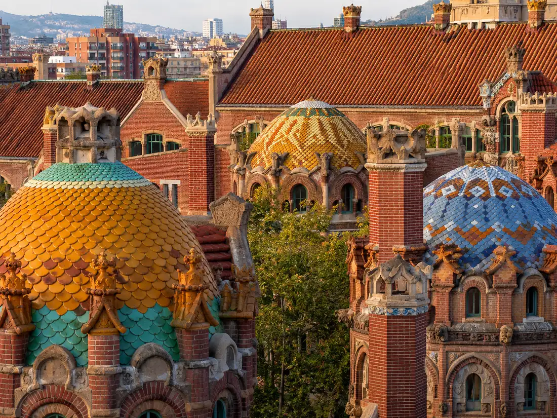 Tiled pavilion domes glowing in morning light